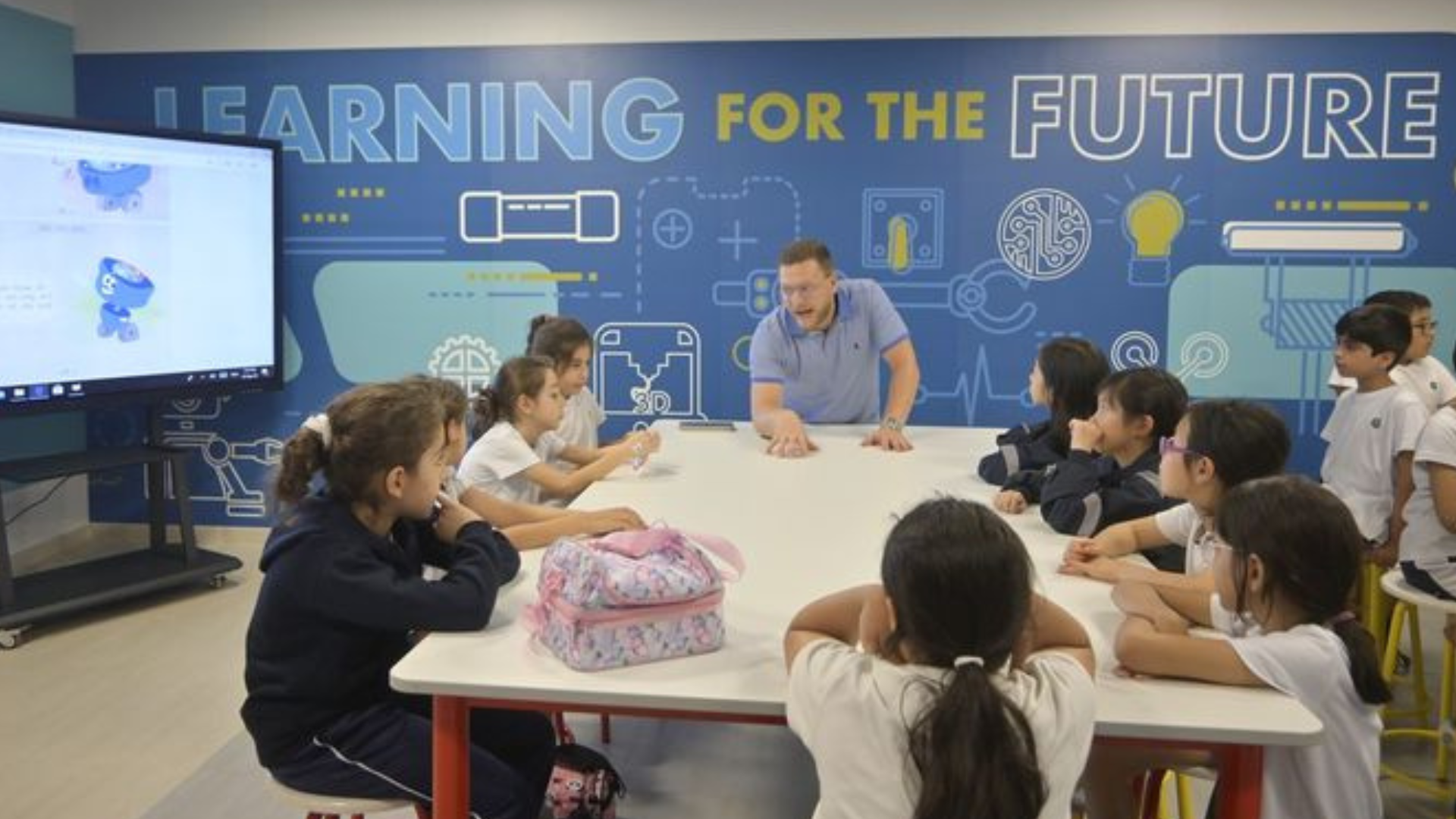 Teacher with children in classroom